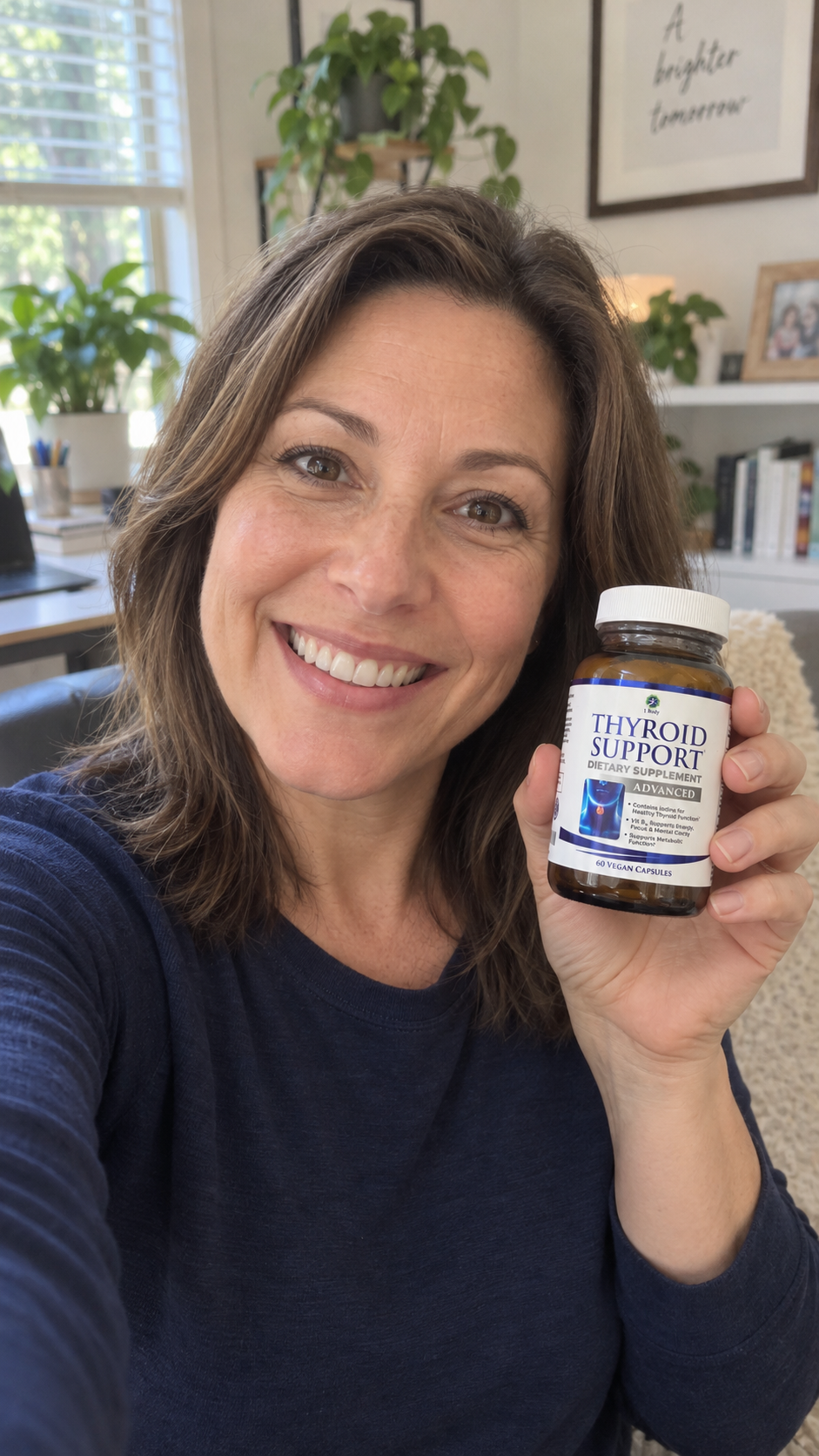 The same customer smiling naturally while holding 1 Body Thyroid Support